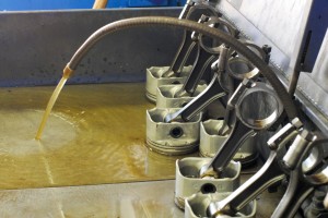 A parts cleaning system is designed to use less solvent or cleaner when cleaning boat parts. Photo: Michigan Sea Grant.