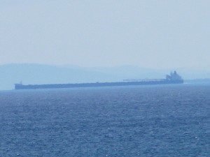 A freighter travels in the distance along Lake Superior. Photo: Flickr/CC.