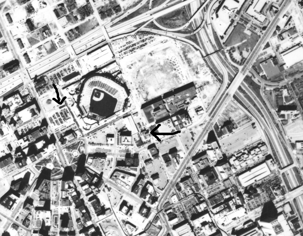2000: The arrow on the left points to the middle of a parking area, where the Gem used to be. The arrow on the right shows the theater in its new location.