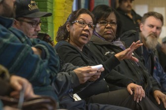 Residents of Chicago’s Southeast Side strategize about fighting petcoke at a meeting April 15. Photo courtesy of Lloyd DeGrane.