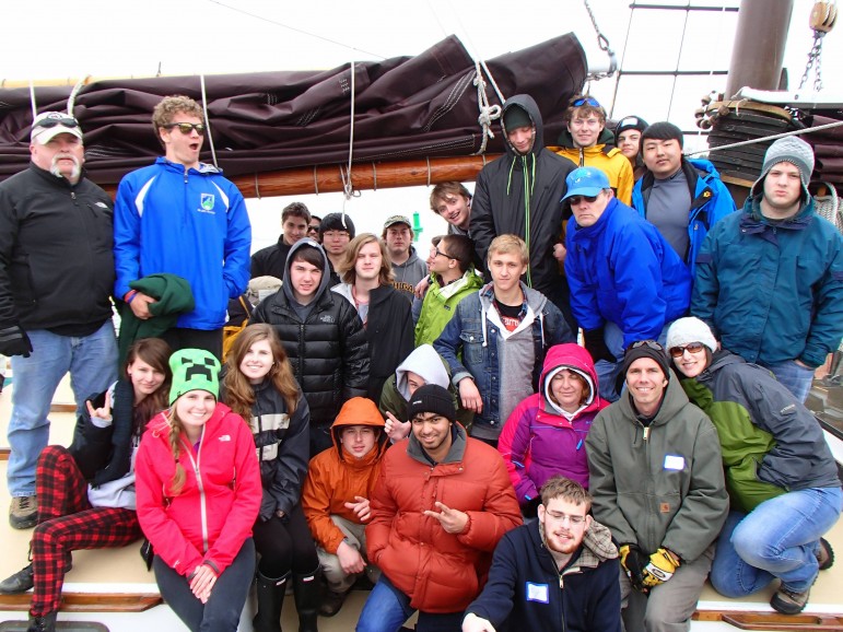Students at the Leelenau School enjoy a chilly spring day aboard an Inland Seas Education Center vessel.