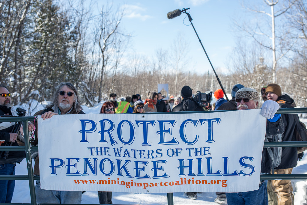 Protestors stand at the entrance of the proposed mine site in the Penokee mountains in northern Wisconsin. Image: Al Jazeera America.