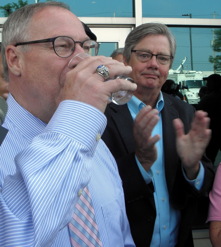 Toledo Mayor Michael Collins drains his first glass of tap water in 72 hours, following a citywide drinking water ban due to toxic algae. Image: Karen Schaefer