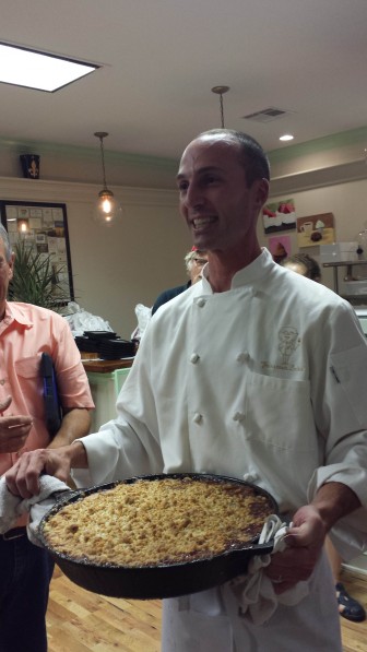 Johnny Blancher explains how he incorporated Formosan termites in the streusel of this peach cobbler. Image: David Poulson