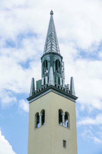 Detail view of the belfry and spire. Image: John F. Martin, Source: National Register of Historic Places nomination form