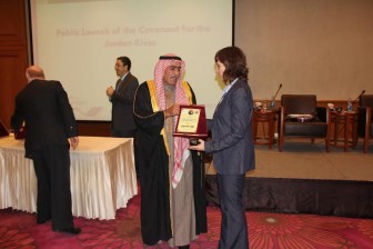 Rachel Havrelock, a professor at the University of Illinois at Chicago, is acknowledged by the Jordanian minister of tourism for her water management efforts in the Jordan Valley. Image: Rachel Havrelock