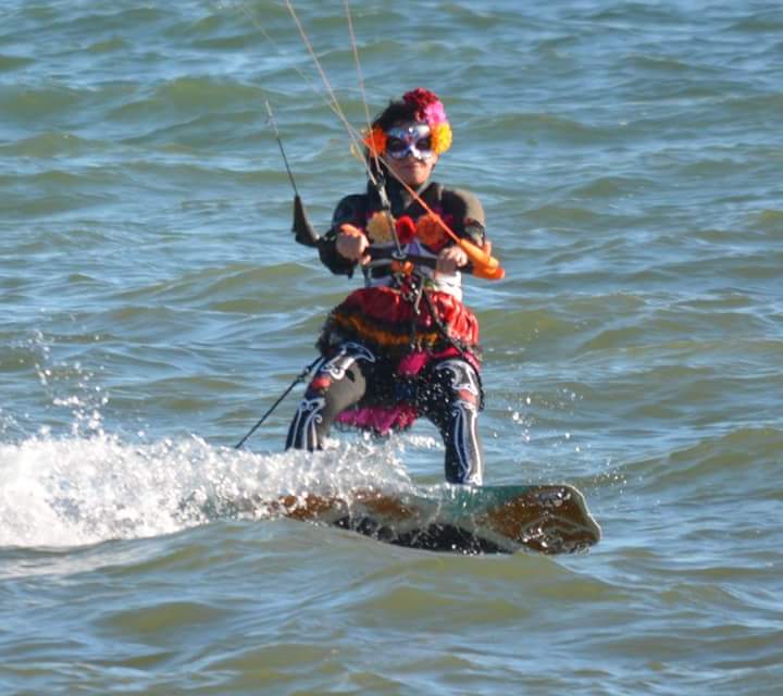 Trish Crowder of Harrison Township, Michigan, fashioned her own Halloween kiteboarding apparel. Crowder owns Exelnt Designs in Warren, Michigan where she makes custom swimsuits. Here she models her new duds recently at Lake St. Claire's Metro Beach Park  in Harrison Township, Michigan. Image: Scott Crowder  
