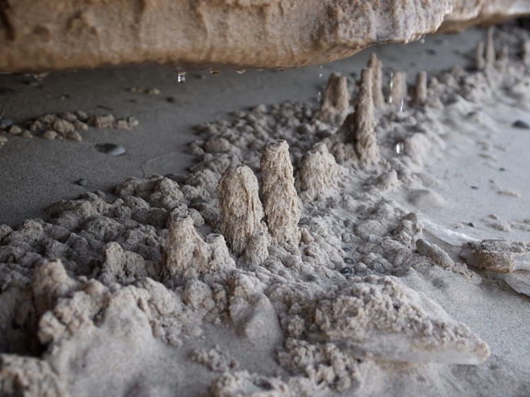 Sand stalagmites form on the shore of Lake Michigan. Image: David Marvin.