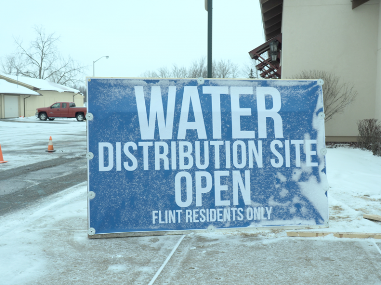 The sign for water outside Our Lady of Guadalupe Church in Flint. Image: Amanda Proscia