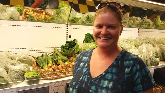 Flint grocery store owner Erin Caudell is helping to launch the new Flint Fresh initiative. Image: Kevin Lavery, WKAR.