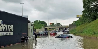 Traffic caught in flooding on I-94 near Detroit in 2021. Detroit has experienced flooding after heavy rainfall, due in part to its stormwater system. Image: Michigan State Police