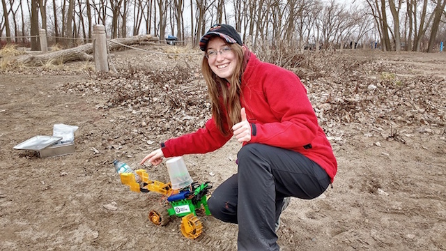 Kennedy with her robot. Image: Robot Missions