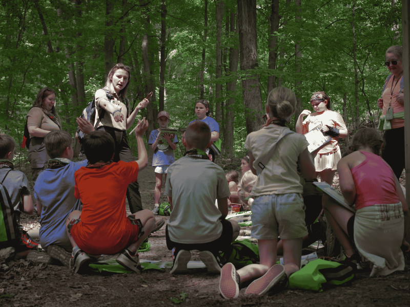 A group of students participating in a learning activity at a state park