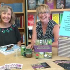 The two authors of "Chasing Wildflowers" pose for a portrait photo