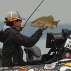 Angler catching a fish.