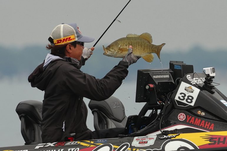 Angler catching a fish.