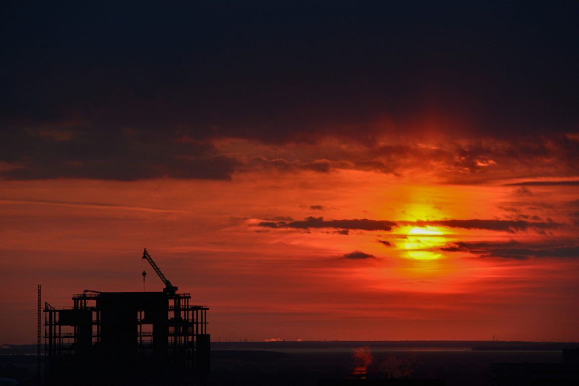 Sunrise over a construction site