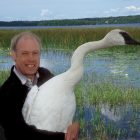 Henderson holding a swan