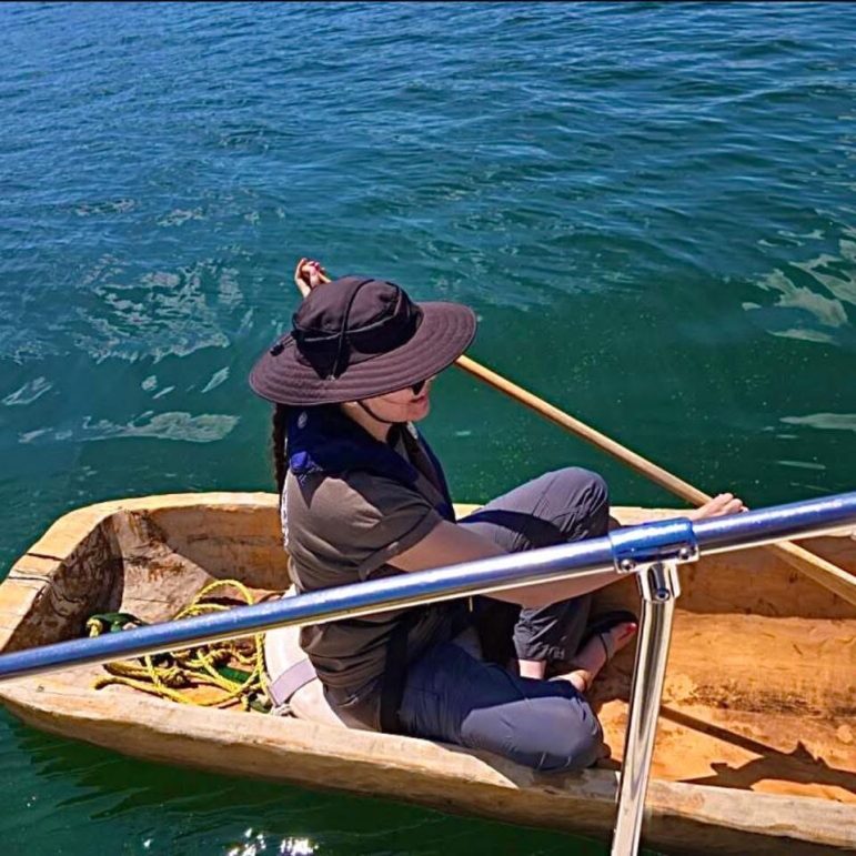 Miranda Wāqsanāhkuhkiw in a canoe.