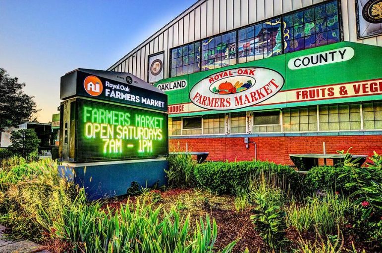 The Royal Oak Farmers Market sign and building.
