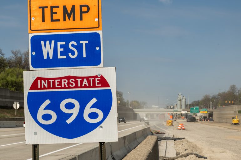 A temporary sign marks the I-696 “Restore the Reuther” construction zone in Southeast Michigan.